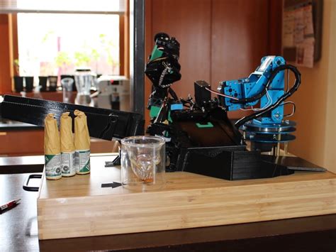 Mini Robotic Bartender automatically opens and pours a bottle of your ...