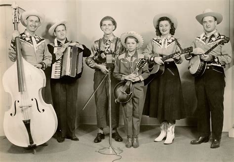 The Billboard replaced the term 'hillbilly' with 'folk songs and blues ...