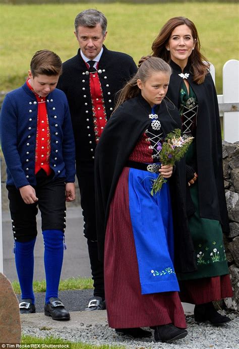 The Danish royal family don traditional Faroese national dress for church | Daily Mail Online