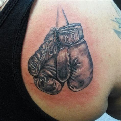 Boxing gloves black and gray tattoo | Boxing tattoos, Boxing gloves tattoo, Tattoos