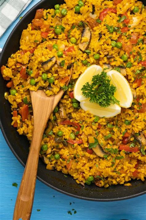 This vegan paella is amazing! It's bursting with flavor, fresh veggies ...