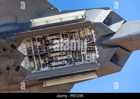 US Air Force F22 Raptor fighter jet with its bomb bay doors open Stock Photo - Alamy