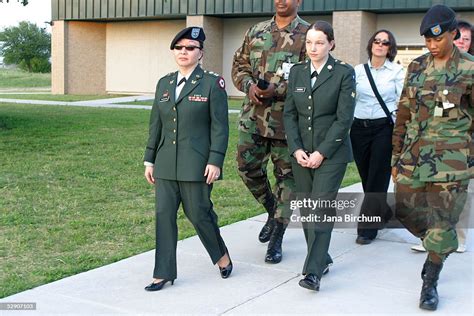 Specialist Sabrina Harman , accompanied by her military attorney,... News Photo - Getty Images