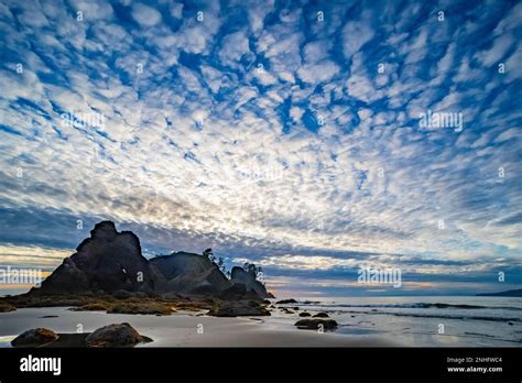 Dramatic clouds at sunset over Point of Arches and Shi Shi Beach in ...