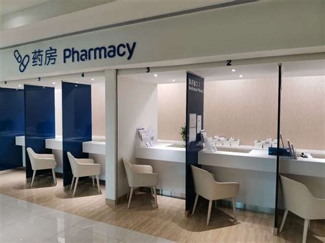 Pharmacy Interior Design with Blue Walls and White Chairs