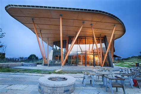 Vance Tsing Tao Pearl Hill visitor center blends into the landscape with a rolling green roof ...