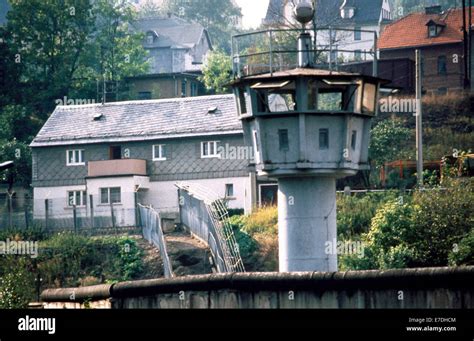 The inner German border with wall, border fence and guard tower Stock ...