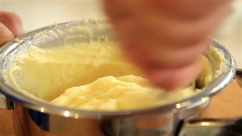 Mashing Potatoes In Stainless Steel Saucepan Stock Footage SBV-333558652 - Storyblocks