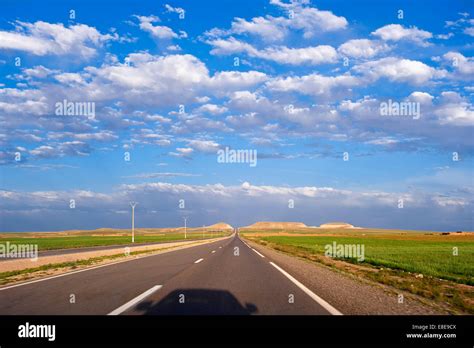 Horizontal perspective view of a long open road in Morocco Stock Photo ...