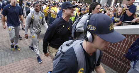 Michigan's Jim Harbaugh has same record through 31 games as Brady Hoke