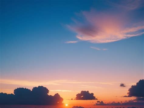 Premium AI Image | Serenity in Azure Captivating Sunset Sky with Tranquil Blue Hues