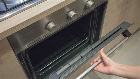 Should You Store Your Pots And Pans In The Oven? A Professional Organizer Weighs In