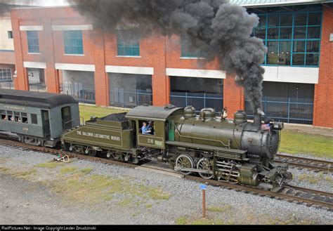 an old fashioned steam train is on the tracks