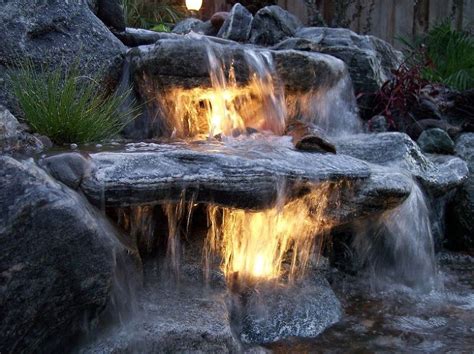 Underwater Lighting in a Waterfall | Water fountains outdoor, Pond landscaping, Waterfalls backyard