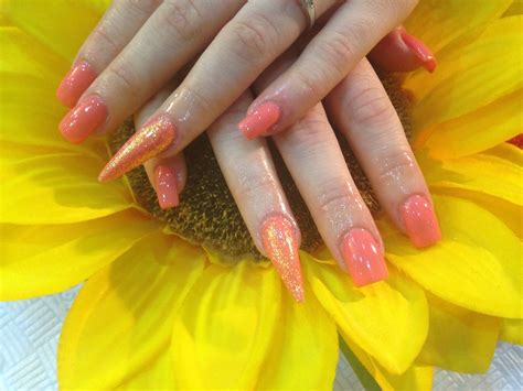 Acrylic nails with bright orange gel and orange glitter du… | Flickr