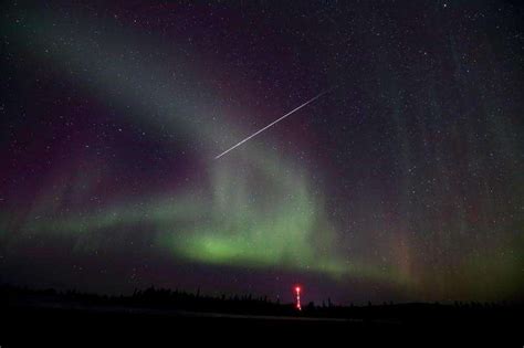 Image: Taurid meteor captured against Northern lights