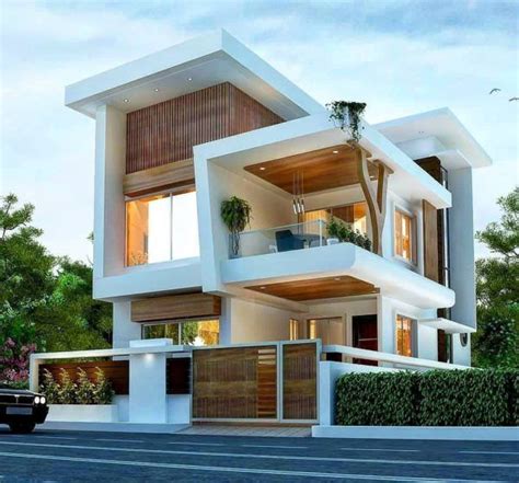 a car is parked in front of a two story house with balconies on the second floor