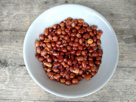 Kacang Tanah Goreng or fried peanuts. Indonesian culinary food 8726725 Stock Photo at Vecteezy