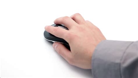 Hand Holding And Moving A Computer Mouse Against A White Background Stock Footage Video 3039457 ...