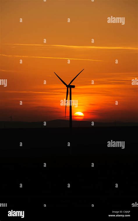 wind turbine sunset Stock Photo - Alamy