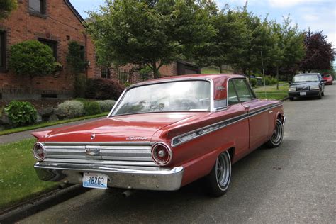 OLD PARKED CARS.: 1963 Ford Fairlane 500 Sports Coupe.