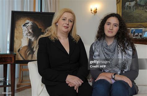 Suha Arafat poses with her daughter Zahwa Arafat in front of a... News Photo - Getty Images