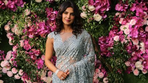 Priyanka Chopra In A Designer Saree By Tarun Tahiliani At Akash Ambani's Wedding | VOGUE India