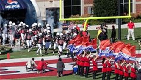 Flames running onto the field inside Williams Stadium at Liberty ...