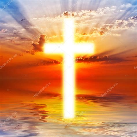 Cross appearing on sunrise sky — Stock Photo © merrydolla #14461825