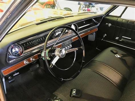 the interior of an old car is clean and ready to be used