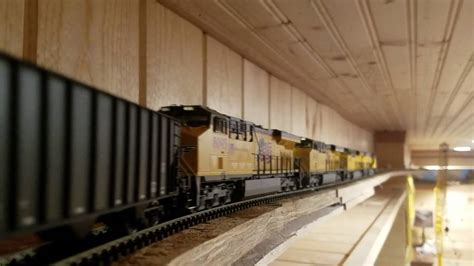 Long HO scale coal train goes around ceiling layout - YouTube