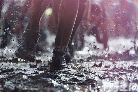 Mud race runners stock image. Image of muddy, runner - 75303265