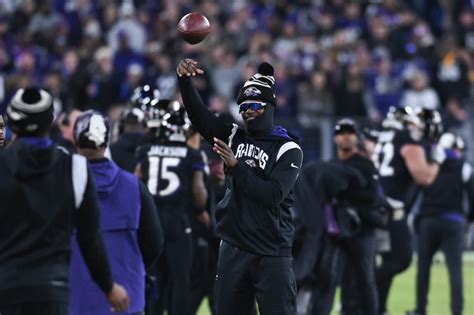 Report: Lamar Jackson facing 'uphill battle' to play in Ravens-Bengals playoff game - Ahn Fire ...