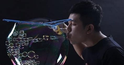 Man Sets Guinness World Record - Most Bubbles Blown In A Large Bubble