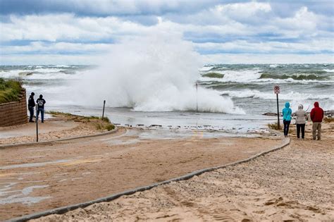 Lake Michigan waves exceeding 10 feet tall bash shoreline during storm - mlive.com