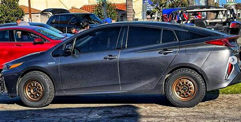 Prius PRIME lifted with the 2" inch lift kit looks ready for battle! : r/priusoffroad