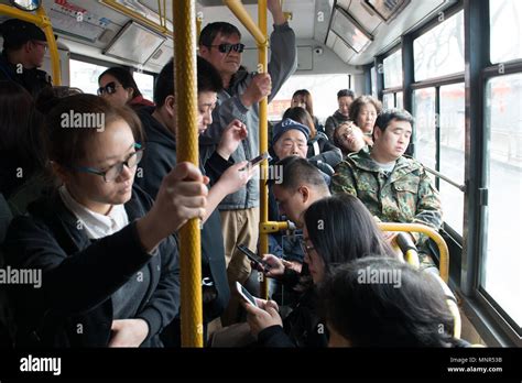 Crowded bus in Beijing China Stock Photo - Alamy