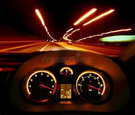 Speeding car at night. Speeding road racer car at night with ...