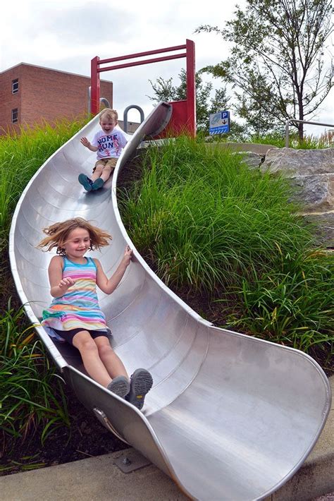 Embankment Curved Slide Chute | Playground equipment, Playground, Slides