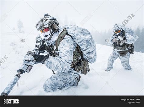 Winter Arctic Mountains Warfare. Image & Photo | Bigstock