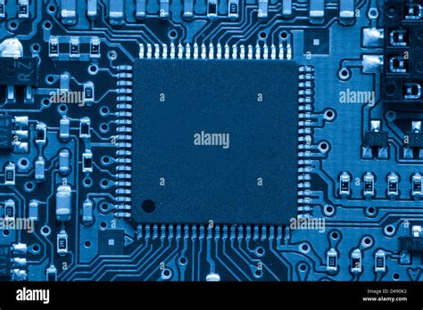 Blue electronic circuit Stock Photo - Alamy