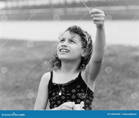 Girl flying a kite stock photo. Image of active, girl - 24065836