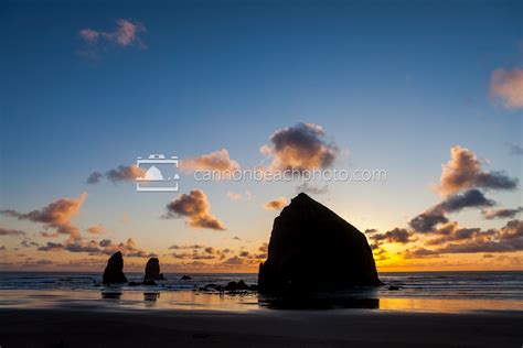 Haystack Rock Silhouette, Sunset Clouds - Cannon Beach Photo