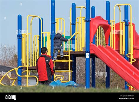 Playground slides hi-res stock photography and images - Alamy