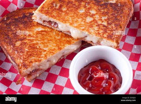 grilled cheese and bacon sandwiches Stock Photo - Alamy