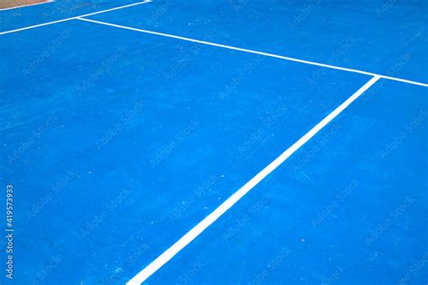 Blue tennis court with white mark. Empty sport field photo. Hard cover ...