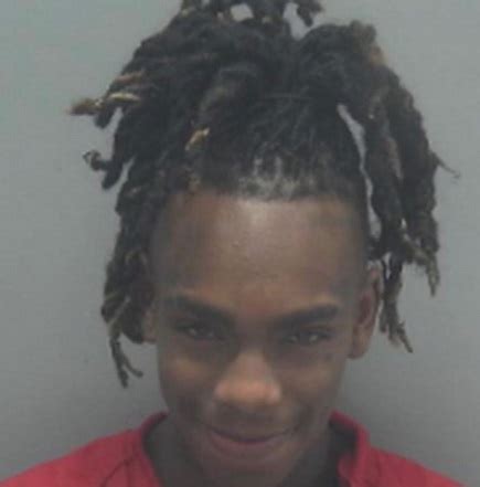 PHOTO YNW Melly Smiling In Mugshot