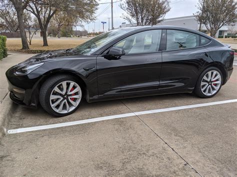 Black Model 3 with Chrome delete and silver wheels – Tesla Model 3 Wiki