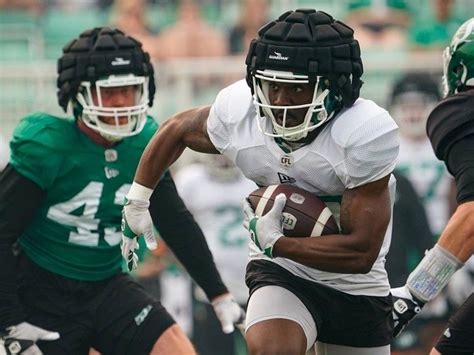 Photos: Fans flock to see Sask. Roughriders on Green and White Day ...