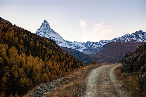 Download Mountain Path & Snowy Peaks Royalty Free Stock Photo and Image